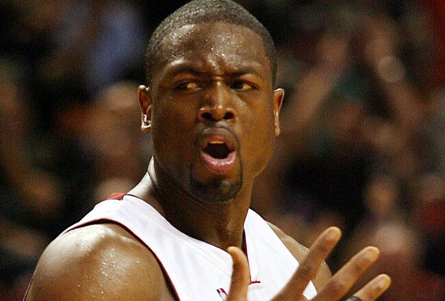 MIAMI - APRIL 25:  Guard Dwyane Wade #3 of the Miami Heat reacts against the Boston Celtics in Game Four of the Eastern Conference Quarterfinals during the 2010 NBA Playoffs at American Airlines Arena on April 25, 2010 in Miami, Florida. Wdae had 46 points as the Heat defeated the Celtics 101-92. NOTE TO USER: User expressly acknowledges and agrees that, by downloading and/or using this Photograph, User is consenting to the terms and conditions of the Getty Images License Agreement.  (Photo by Marc Serota/Getty Images)
