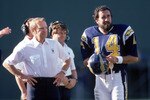 SAN DIEGO - DECEMBER 1:  Head coach Don Coryell and quarterback Dan Fouts #14 of the San Diego Chargers discuss strategy on the sidelines during a game against Buffalo Bills at Jack Murphy Stadium on December 1, 1985 in San Diego, California.  The Chargers won 40-7.  (Photo by George Rose/Getty Images)