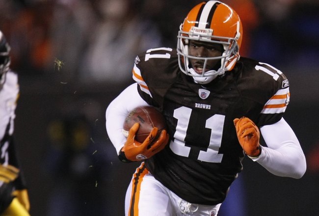 CLEVELAND - DECEMBER 10:  Mohamed Massaquoi #11 of the Cleveland Browns runs with the ball during the game against the Pittsburgh Steelers on December 10, 2009 at Cleveland Browns Stadium in Cleveland, Ohio. Cleveland won the game 13-6.  (Photo by Gregory Shamus/Getty Images)