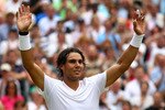 LONDON, ENGLAND - JULY 02:  Rafael Nadal of Spain celebrates match point during the Men's Semi Final match against Andy Murray of Great Britain on Day Eleven of the Wimbledon Lawn Tennis Championships at the All England Lawn Tennis and Croquet Club on July 2, 2010 in London, England.  (Photo by Julian Finney/Getty Images)