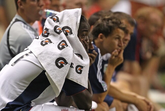 SANDY, UT - JULY 2:  Captin Shalrie Joseph #21 of the New England Revolution sits on the bench late in the game against Real Salt Lake during the second half of an MLS soccer game at Rio Tinto Stadium July 2, 2010 in Sandy, Utah. Real beat the Revolution 5-0. (Photo by George Frey/Getty Images)