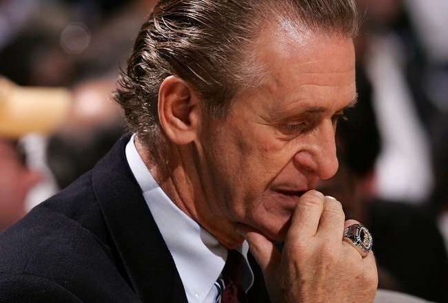 MILWAUKEE - DECEMBER 20:  Head coach Pat Riley of the Miami Heat  puts his head down against the Milwaukee Bucks in the closing minutes of the game on December 20, 2006 at the Bradley Center in Milwaukee, Wisconsin. The Bucks defeated the Heat 121-95.  NOTE TO USER: User expressly acknowledges and agreees that, by downloading and/or using this Photograph, User is consenting to the terms and conditions of the Getty Images License Agreement.  (Photo by Jonathan Daniel/Getty Images)