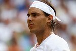 LONDON, ENGLAND - JULY 02:  Rafael Nadal of Spain in action during the Men's Semi Final match against Andy Murray of Great Britain on Day Eleven of the Wimbledon Lawn Tennis Championships at the All England Lawn Tennis and Croquet Club on July 2, 2010 in London, England.  (Photo by Julian Finney/Getty Images)