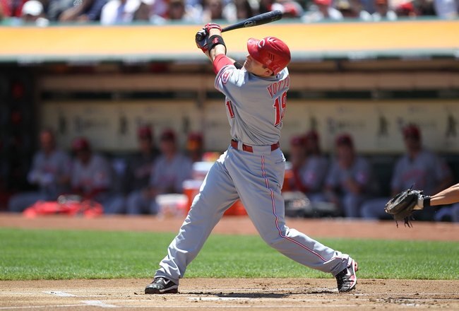 OAKLAND, CA - JUNE 23:  Joey Votto #19 of the Cincinnati Reds in action against the Oakland Athletics during an MLB game at the Oakland-Alameda County Coliseum on June 23, 2010 in Oakland, California.  (Photo by Jed Jacobsohn/Getty Images)