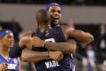 ARLINGTON, TX - FEBRUARY 14:  LeBron James #23 and Dwyane Wade #3 of the Eastern Conference celebrate their 141-139 victory over the Western Conference during the NBA All-Star Game, part of 2010 NBA All-Star Weekend at Cowboys Stadium on February 14, 2010 in Arlington, Texas. NOTE TO USER: User expressly acknowledges and agrees that, by downloading and or using this photograph, User is consenting to the terms and conditions of the Getty Images License Agreement.  (Photo by Ronald Martinez/Getty Images)