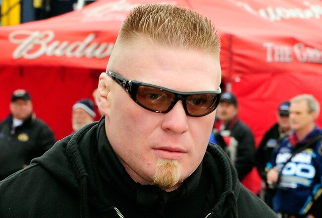 DAYTONA BEACH, FL - FEBRUARY 13:  MMA fighter Brock Lesnar walks in the garage area during practice for the Daytona 500 at Daytona International Speedway on February 13, 2010 in Daytona Beach, Florida.  (Photo by Sam Greenwood/Getty Images for NASCAR)