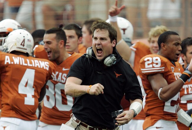 AUSTIN, TX - SEPTEMBER 5:  Defensive coordinator Will Muschamp of the Texas Longhorns gets pumped up after a turnover by the Louisiana Monroe Warhawks in the first quarter on September 5, 2009 at Darrell K Royal-Texas Memorial Stadium in Austin, Texas.  (Photo by Brian Bahr/Getty Images)