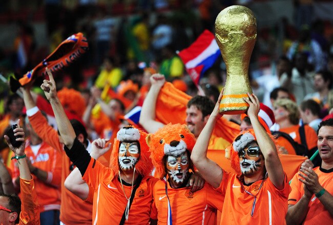 PORT ELIZABETH, SOUTH AFRICA - JULY 02:  Netherlands fans celebrate victory, and progression to the semi-finals, following the 2010 FIFA World Cup South Africa Quarter Final match between Netherlands and Brazil at Nelson Mandela Bay Stadium on July 2, 2010 in Nelson Mandela Bay/Port Elizabeth, South Africa.  (Photo by Jamie McDonald/Getty Images)