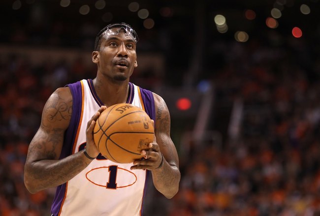 PHOENIX - MAY 03:  Amar'e Stoudemire #1 of the Phoenix Suns shoots a free throw shot against the San Antonio Spurs during Game One of the Western Conference Semifinals of the 2010 NBA Playoffs at US Airways Center on May 3, 2010 in Phoenix, Arizona. The Suns defeated the Spurs 111-102 to take a 1-0 series lead.  NOTE TO USER: User expressly acknowledges and agrees that, by downloading and or using this photograph, User is consenting to the terms and conditions of the Getty Images License Agreement.  (Photo by Christian Petersen/Getty Images)