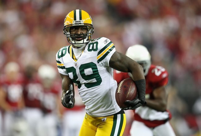 GLENDALE, AZ - JANUARY 10:  Wide receiver James Jones #89 of the Green Bay Packers runs with the football during the 2010 NFC wild-card playoff game against the Arizona Cardinals at the Universtity of Phoenix Stadium on January 10, 2010 in Glendale, Arizona.  The Cardinals defeated the Packers  51-45 in overtime.  (Photo by Christian Petersen/Getty Images)
