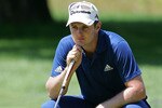 CROMWELL, CT - JUNE 25:  Justin Rose of England lines up a putt during the second round of the Travelers Championship held at TPC River Highlands on June 25, 2010 in Cromwell, Connecticut.  (Photo by Michael Cohen/Getty Images)