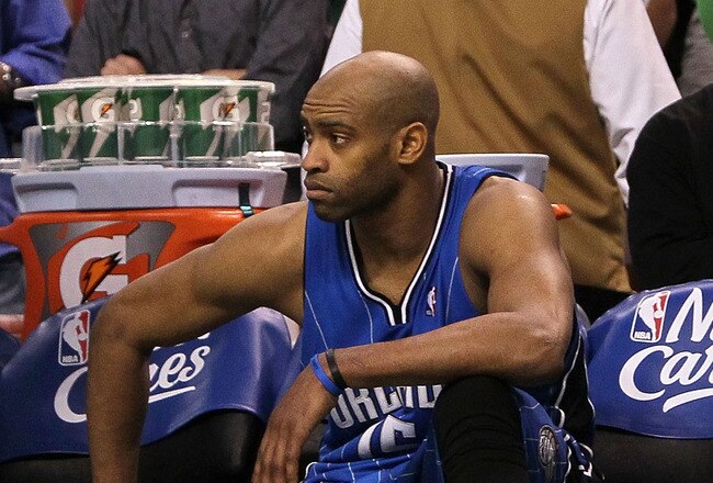 BOSTON - MAY 28:  Vince Carter #15 of the Orlando Magic looks on from the bench dejected after they lost 96-84 against the Boston Celtics in Game Six of the Eastern Conference Finals during the 2010 NBA Playoffs at TD Garden on May 28, 2010 in Boston, Massachusetts.  NOTE TO USER: User expressly acknowledges and agrees that, by downloading and/or using this Photograph, user is consenting to the terms and conditions of the Getty Images License Agreement.  (Photo by Jim Rogash/Getty Images)