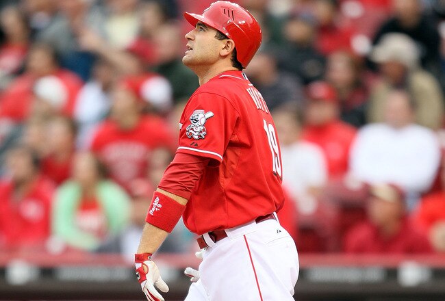 CINCINNATI - MAY 18:  Joey Votto #19 of the Cincinnati Reds watches his home run leave the park in the 8th inning during the game against the Milwaukee Brewers at Great American Ball Park on May 18, 2010 in Cincinnati, Ohio. The Reds won 5-4.  (Photo by Andy Lyons/Getty Images)
