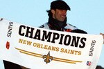 NEW ORLEANS - FEBRUARY 09:  Nick Leckey #60 and Quarterback Drew Brees #9 of the New Orleans Saints celebrate as they parade though the city after winning Super Bowl XLIV on February 9, 2010 in New Orleans, Louisiana.  (Photo by Sean Gardner/Getty Images)