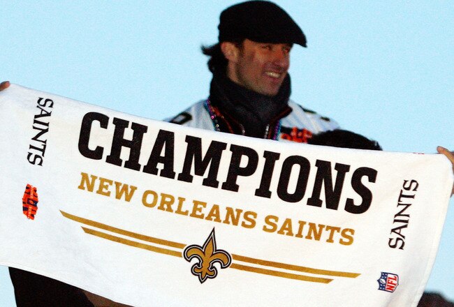 NEW ORLEANS - FEBRUARY 09:  Nick Leckey #60 and Quarterback Drew Brees #9 of the New Orleans Saints celebrate as they parade though the city after winning Super Bowl XLIV on February 9, 2010 in New Orleans, Louisiana.  (Photo by Sean Gardner/Getty Images)