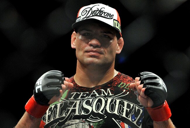 LOS ANGELES, CA - OCTOBER 24:  UFC fighter Cain Velasquez poses after his victory over UFC fighter Ben Rothwell (not pictured) in their Heavyweight bout at UFC 104: Machida vs. Shogun at Staples Center on October 24, 2009 in Los Angeles, California.  Velasquez won the fight by way of TKO.  (Photo by Jon Kopaloff/Getty Images)