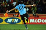 JOHANNESBURG, SOUTH AFRICA - JULY 02:  Sebastian Abreu of Uruguay celebrates scoring the winning penalty in the shoot out during the 2010 FIFA World Cup South Africa Quarter Final match between Uruguay and Ghana at the Soccer City stadium on July 2, 2010 in Johannesburg, South Africa.  (Photo by Stanley Chou/Getty Images)