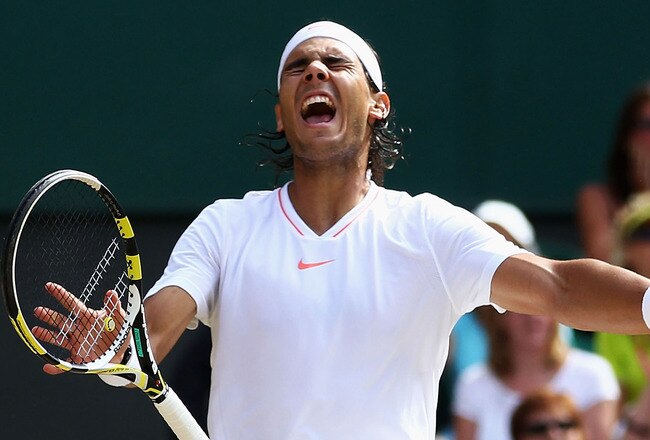 LONDON, ENGLAND - JULY 04:  Rafael Nadal of Spain celebrates Championship Point during his Mens Singles Final match against Tomas Berdych of Czech Republic on Day Thirteen of the Wimbledon Lawn Tennis Championships at the All England Lawn Tennis and Croquet Club on July 4, 2010 in London, England.  (Photo by Julian Finney/Getty Images)