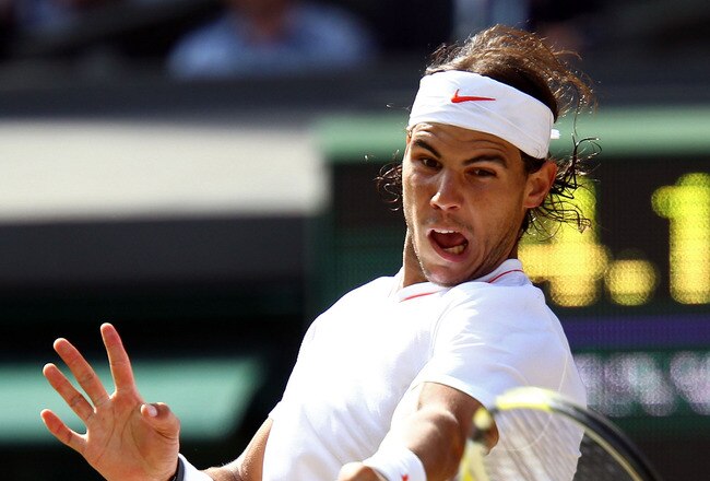 LONDON, ENGLAND - JULY 04:  Rafael Nadal of Spain plays a shot during the Men's Singles Final match against Tomas Berdych of Czech Republic on Day Thirteen of the Wimbledon Lawn Tennis Championships at the All England Lawn Tennis and Croquet Club on July 4, 2010 in London, England.  (Photo by Julian Finney/Getty Images)