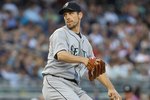 NEW YORK - JUNE 29:  Cliff Lee #36 of the Seattle Mariners pitches against the New York Yankees at Yankee Stadium on June 29, 2010 in the Bronx borough of New York City.  (Photo by Nick Laham/Getty Images)