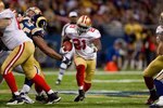 ST. LOUIS - JANUARY 3:  Frank Gore #21 of the San Francisco 49ers carries the ball during the game against the St. Louis Rams at the Edward Jones Dome on January 3, 2010 in St. Louis, Missouri.  The 49ers beat the Rams 28-6.  (Photo by Dilip Vishwanat/Getty Images)