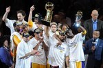 LOS ANGELES, CA - JUNE 17:  Derek Fisher #2 and Kobe Bryant #24 of the Los Angeles Lakers celebrate after the Lakers defeated the Boston Celtics 83-79 in Game Seven of the 2010 NBA Finals at Staples Center on June 17, 2010 in Los Angeles, California.  NOTE TO USER: User expressly acknowledges and agrees that, by downloading and/or using this Photograph, user is consenting to the terms and conditions of the Getty Images License Agreement.  (Photo by Lisa Blumenfeld/Getty Images)