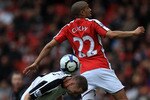 LONDON, ENGLAND - MAY 09: Gael Clichy of Arsenal  clashes with Fredrik Stoor of Fulham during the Barclays Premier League match between Arsenal and Fulham at The Emirates Stadium on May 9, 2010 in London, England.  (Photo by David Cannon/Getty Images)