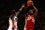 NEW YORK - NOVEMBER 06:  LeBron James #23 of the Cleveland Cavaliers shoots a basket against the New York Knicks at Madison Square Garden November 6, 2009 in New York City. NOTE TO USER: User expressly acknowledges and agrees that, by downloading and/or using this Photograph, User is consenting to the terms and conditions of the Getty Images License Agreement.  (Photo by Chris McGrath/Getty Images)
