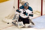 CHICAGO - MAY 23:  Goaltender Evgeni Nabokov #20 of the San Jose Sharks makes a save while taking on the Chicago Blackhawks in Game Four of the Western Conference Finals during the 2010 NHL Stanley Cup Playoffs at the United Center on May 23, 2010 in Chicago, Illinois.  (Photo by Jonathan Daniel/Getty Images)