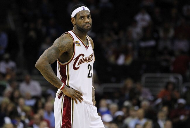 CLEVELAND - MAY 11: LeBron James #23 of the Cleveland Cavaliers looks on while playing the Boston Celtics in Game Five of the Eastern Conference Semifinals during the 2010 NBA Playoffs at Quicken Loans Arena on May 11, 2010 in Cleveland, Ohio. Boston won the game 120-88 to take a 3-2 series lead. NOTE TO USER: User expressly acknowledges and agrees that, by downloading and or using this photograph, User is consenting to the terms and conditions of the Getty Images License Agreement.  (Photo by Gregory Shamus/Getty Images)