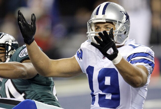 ARLINGTON, TX - JANUARY 9:  Miles Austin #19 of the Dallas Cowboys wants a passing interference penalty called in the endzone on Sheldon Brown #24 of the Philadelphia Eagles in the second quarter during the 2010 NFC wild-card playoff game at Cowboys Stadium on January 9, 2010 in Arlington, Texas. (Photo by Jamie Squire/Getty Images)