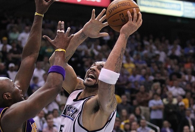 SALT LAKE CITY - MAY 10:  Carlos Boozer #5 of the Utah Jazz shoots against the Los Angeles Lakers during Game Four of the Western Conference Semifinals of the 2010 NBA Playoffs on May 10, 2010 at Energy Solutions Arena in Salt Lake City, Utah. NOTE TO USER: User expressly acknowledges and agrees that, by downloading and or using this Photograph, user is consenting to the terms and conditions of the Getty Images License Agreement.  (Photo by Jed Jacobsohn/Getty Images)