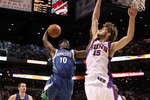 PHOENIX - MARCH 16:  Jonny Flynn #10 of the Minnesota Timberwolves drives to the basket against Robin Lopez #15 of the Phoenix Suns during the NBA game at US Airways Center on March 16, 2010 in Phoenix, Arizona. The Suns defeated the Timberwolves 152-114.  NOTE TO USER: User expressly acknowledges and agrees that, by downloading and or using this photograph, User is consenting to the terms and conditions of the Getty Images License Agreement.  (Photo by Christian Petersen/Getty Images)