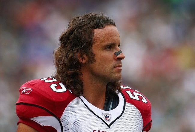 EAST RUTHERFORD, NJ - SEPTEMBER 28:  Travis LaBoy #55 of the Arizona Cardinals looks up field during the game against the New York Jets on September 28, 2008 at Giants Stadium in East Rutherford, New Jersey. The Jets won 56-35. (Photo by Chris McGrath/Getty Images)