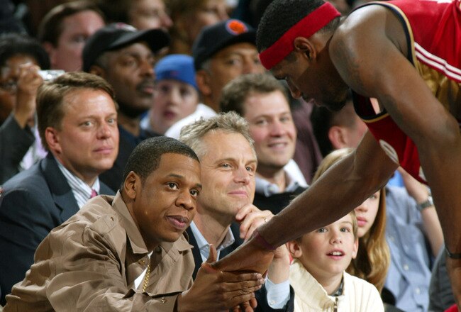 NEW YORK - APRIL 14:  Rapper Jay-Z meets the Cavalier's Lebron James during New York Knicks v Cleveland Cavaliers game at Madison Square Garden on April 14, 2004 in New York City.   (Photo by Ray Amati/Getty Images)