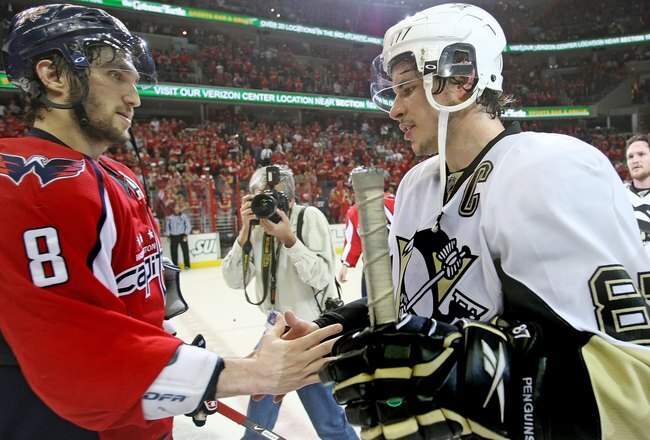 WASHINGTON - MAY 13:  Alex Ovechkin #8 of the Washington Capitals and Sidney Crosby #87 of the Pittsburgh Penguins shake hands after Pittsburgh's 6-2 victory in Game Seven of the Eastern Conference Semifinal  Round of the 2009 Stanley Cup Playoffs at Verizon Center on May 13, 2009 in Washington, DC.  (Photo by Bruce Bennett/Getty Images)