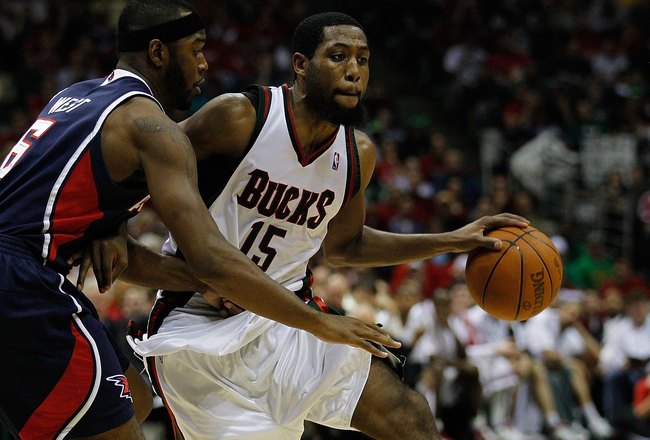 MILWAUKEE - APRIL 30: John Salmons #15 of the Milwaukee Bucks drives around Mario West #6 of the Atlanta Hawks in Game Six of the Eastern Conference Quarterfinals during the 2010 NBA Playoffs at the Bradley Center on April 30, 2010 in Milwaukee, Wisconsin. The Hawks defeated the Bucks 83-69. NOTE TO USER: User expressly acknowledges and agrees that, by downloading and/or using this Photograph, User is consenting to the terms and conditions of the Getty Images License Agreement.  (Photo by Jonathan Daniel/Getty Images)
