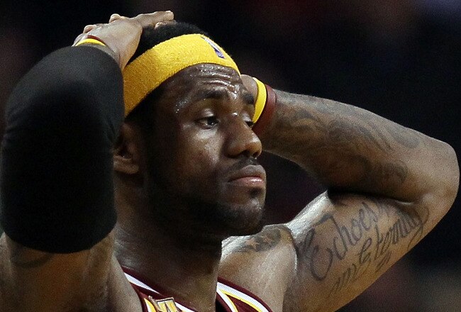 BOSTON - MAY 09:  LeBron James #23 of the Cleveland Cavaliers looks on late in the fourth quarter against the Boston Celtics during Game Four of the Eastern Conference Semifinals of the 2010 NBA playoffs at TD Garden on May 9, 2010 in Boston, Massachusetts. The Celtics defeated the Cavaliers 97-87. NOTE TO USER: User Expressly Acknowledges and agrees that, by downloading and or using this photograph, User is consenting to the terms and conditions of the Getty Images License Agreement.  (Photo by Elsa/Getty Images)