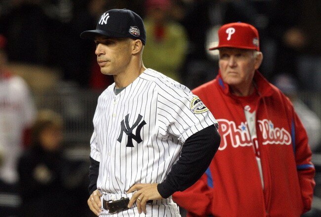 NEW YORK - OCTOBER 28:  Manager Charlie Manuel #41 of the Philadelphia Phillies stands with manager Joe Girardi #27 of the New York Yankees during pregame festivities prior to Game One of the 2009 MLB World Series at Yankee Stadium on October 28, 2009 in the Bronx borough of New York City.  (Photo by Jim McIsaac/Getty Images)