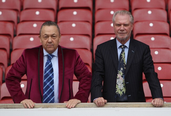 LONDON - JANUARY 19:  David Sullivan (L) and David Gold pose for a photo as they are announced as new joint chairmen of West Ham United during a photocall at Upton Park on January 19, 2010 in London, England.  (Photo by Julian Finney/Getty Images)