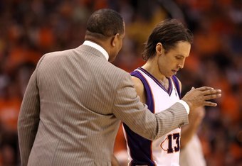 PHOENIX - MAY 29: Head coach Alvin Gentry of the Phoenix Suns talks with Steve Nash #13 during Game Six of the Western Conference finals of the 2010 NBA Playoffs against the Los Angeles Lakers at US Airways Center on May 29, 2010 in Phoenix, Arizona. The Lakers defeated the Suns 111-103. NOTE TO USER: User expressly acknowledges and agrees that, by downloading and or using this photograph, User is consenting to the terms and conditions of the Getty Images License Agreement. (Photo by Christian Petersen/Getty Images)
