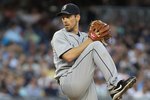 NEW YORK - JUNE 29:  Cliff Lee #36 of the Seattle Mariners pitches against the New York Yankees at Yankee Stadium on June 29, 2010 in the Bronx borough of New York City.  (Photo by Nick Laham/Getty Images)