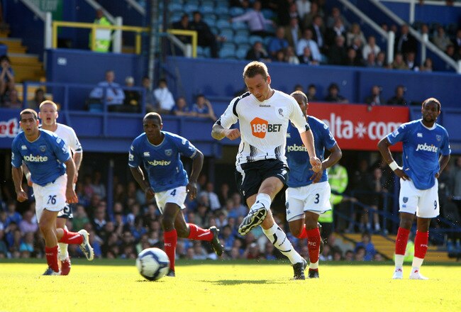 PORTSMOUTH, ENGLAND - SEPTEMBER 12:  Matthew Taylor of Bolton Wanderers scores from the Penalty spot during the Barclays Premier League match between Portsmouth and Bolton Wanderers at Fratton Park on September 12, 2009 in Portsmouth, England.  (Photo by Phil Cole/Getty Images)