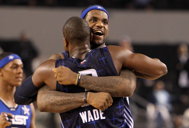 ARLINGTON, TX - FEBRUARY 14:  LeBron James #23 and Dwyane Wade #3 of the Eastern Conference celebrate their 141-139 victory over the Western Conference during the NBA All-Star Game, part of 2010 NBA All-Star Weekend at Cowboys Stadium on February 14, 2010 in Arlington, Texas. NOTE TO USER: User expressly acknowledges and agrees that, by downloading and or using this photograph, User is consenting to the terms and conditions of the Getty Images License Agreement.  (Photo by Ronald Martinez/Getty Images)