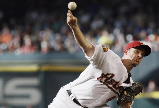 HOUSTON - JUNE 05:  Pitcher Roy Oswalt #44 of the Houston Astros throws against the Chicago Cubs in the first inning at Minute Maid Park on June 5, 2010 in Houston, Texas.  (Photo by Bob Levey/Getty Images)