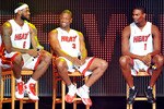 MIAMI - JULY 09:   LeBron James #6, Dwyane Wade #3 and Chris Bosh #1 of the Miami Heat speak after being introduced to fans during a welcome party at American Airlines Arena on July 9, 2010 in Miami, Florida.  (Photo by Doug Benc/Getty Images)