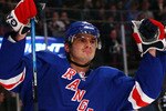 NEW YORK - MARCH 21: Nikolai Zherdev #13 of the New York Rangers celebrates his assist as Sean Avery #16 (R) celebrates scoring the goal against the Buffalo Sabres during their game on March 21, 2009 at Madison Square Garden in New York City.  (Photo by Chris McGrath/Getty Images)