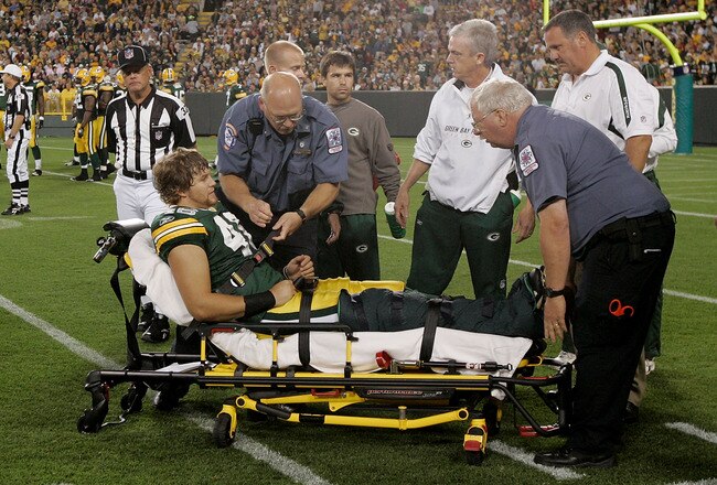 GREEN BAY, WI - AUGUST 22: Tight end Devin Frishknecht #46 of the Green Bay Packers is placed on a stretcher to be taken off the field after an injury against the Buffalo Bills at Lambeau Field on August 22, 2009 in Green Bay. Wisconsin. The Packers defeated the Bills 31-21. (Photo by Scott Boehm/Getty Images)