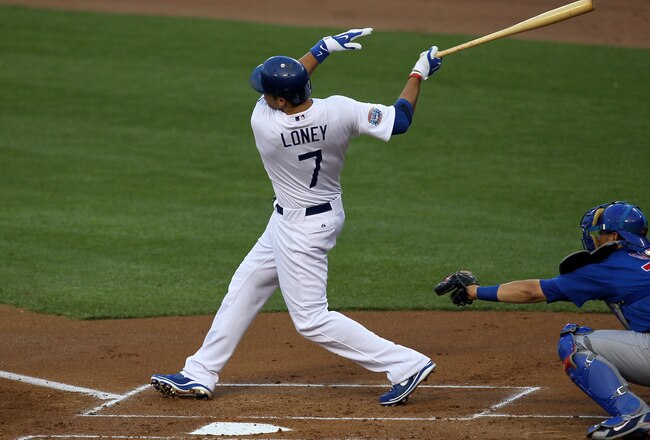 LOS ANGELES - JULY 8: James Loney #7 of the Los Angeles Dodgers hits an RBI single in the second inning against he Chicago Cubs on July 8, 2010 at Dodger Stadium in Los Angeles, California.    (Photo by Stephen Dunn/Getty Images)