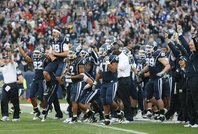 EAST HARTFORD, CT - OCTOBER 31:  The Connecticut Huskies bench celebrates a touchdown in the final minute of the game against the Rutgers Scarlet Knights on October 31, 2009 at Rentschler Field in East Hartford, Connecticut. Rutgers came back and defeated Connecticut 28-24. (Photo by Elsa/Getty Images)